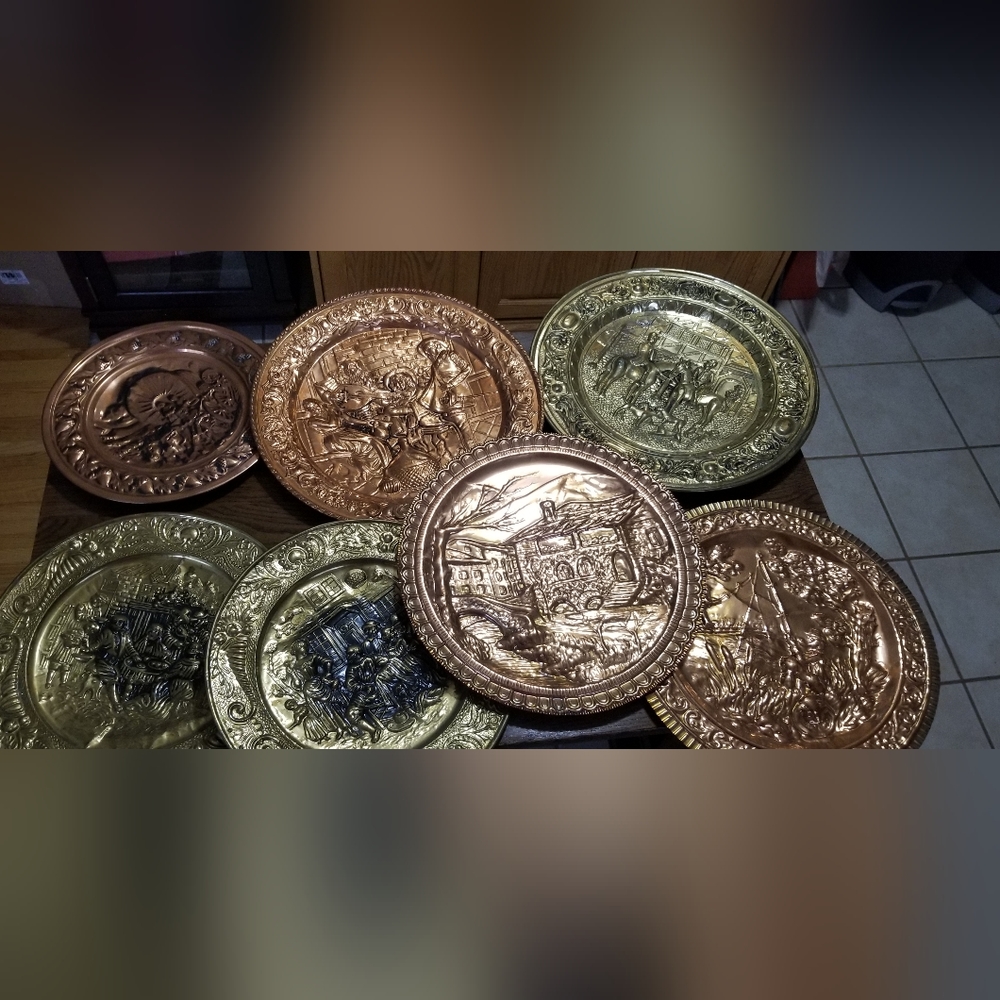 Vintage copper and brass Senic plates.  4 Copper and 3 brass